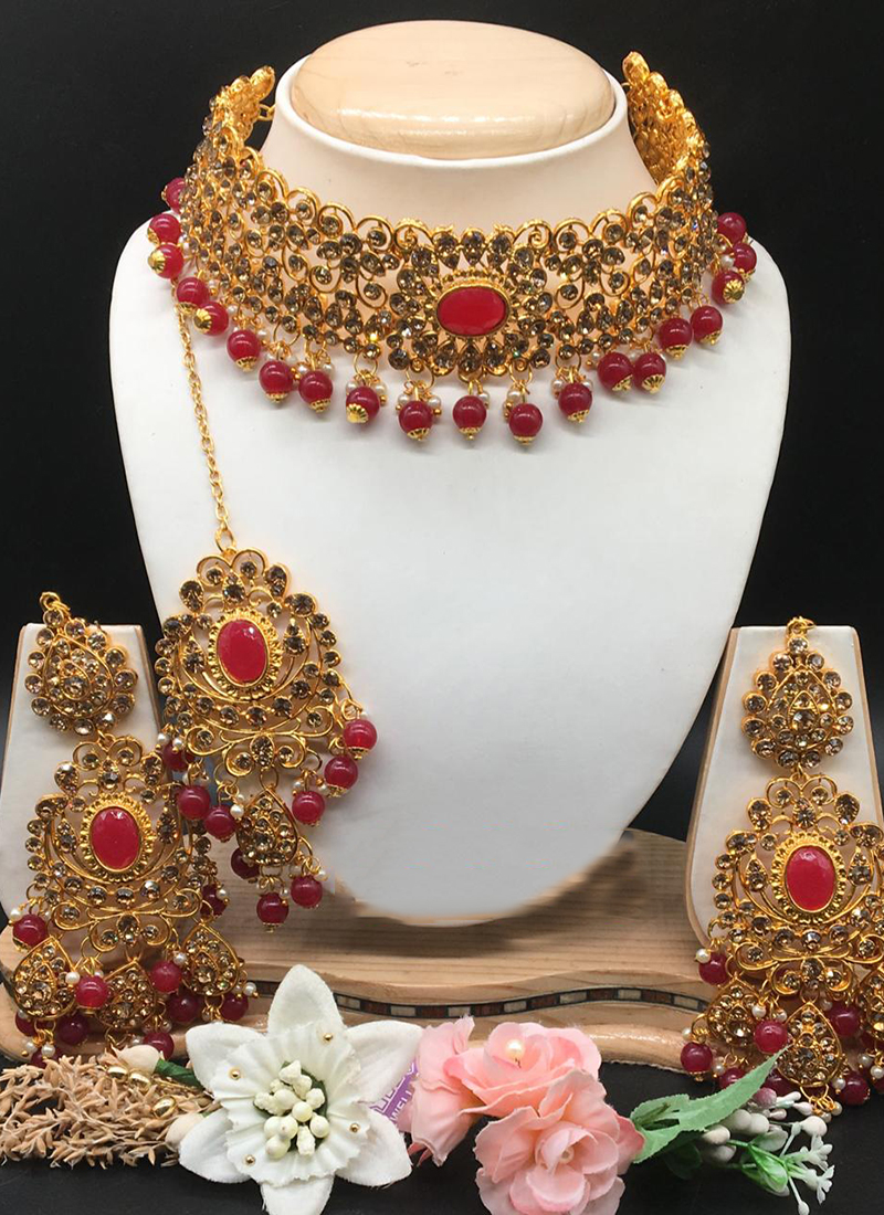 red and gold necklace set