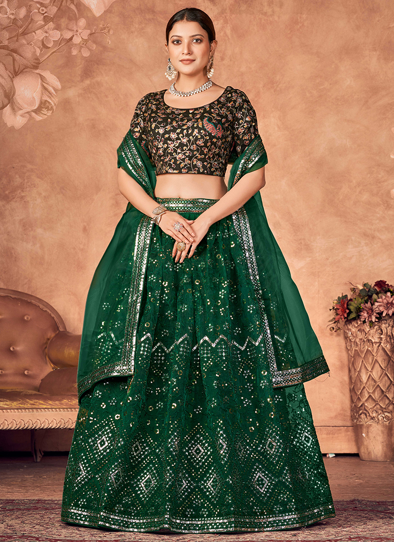 Dark Green Color Embroidered Attractive Party Wear Silk Lehenga choli has a  Regular-fit and is Made From High-Grade Fabrics And Yarn.