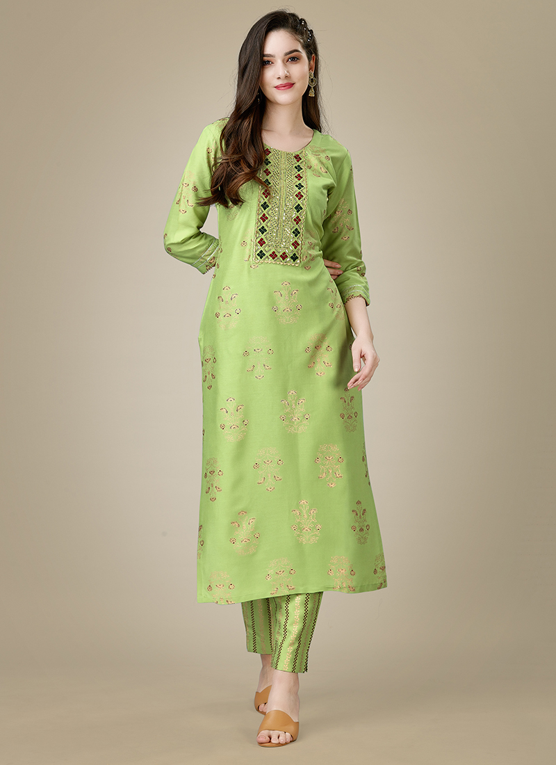 Buy Nikki Fab Green Cotton Printed Stitched Kurti & Leggings are